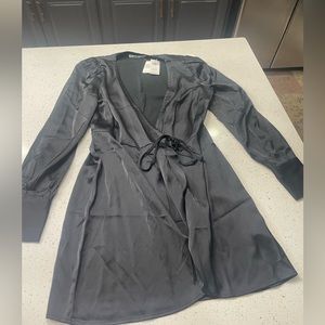 Abercrombie and Fitch. Black silk front tie dress. Size small. Gently worn.